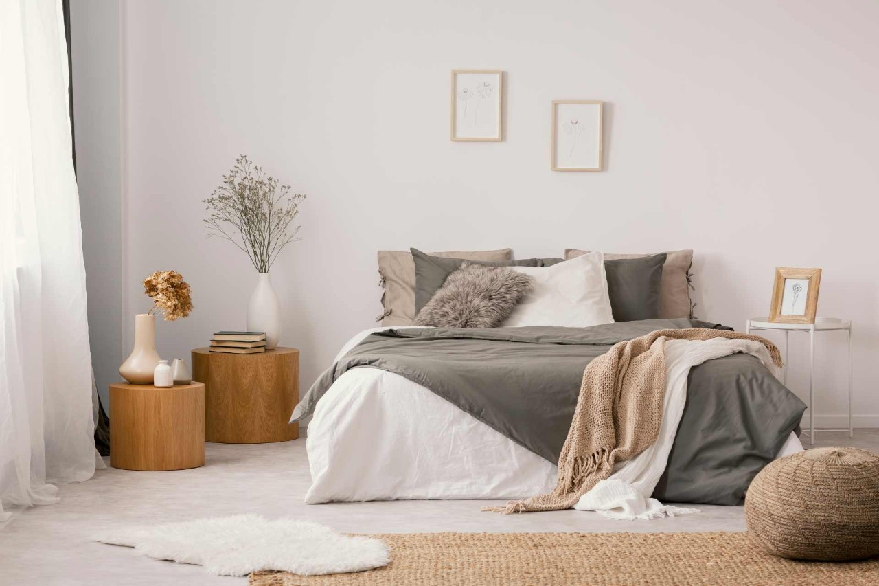 Well-decorated bedroom with a large bed near Newport News, Virginia (VA)