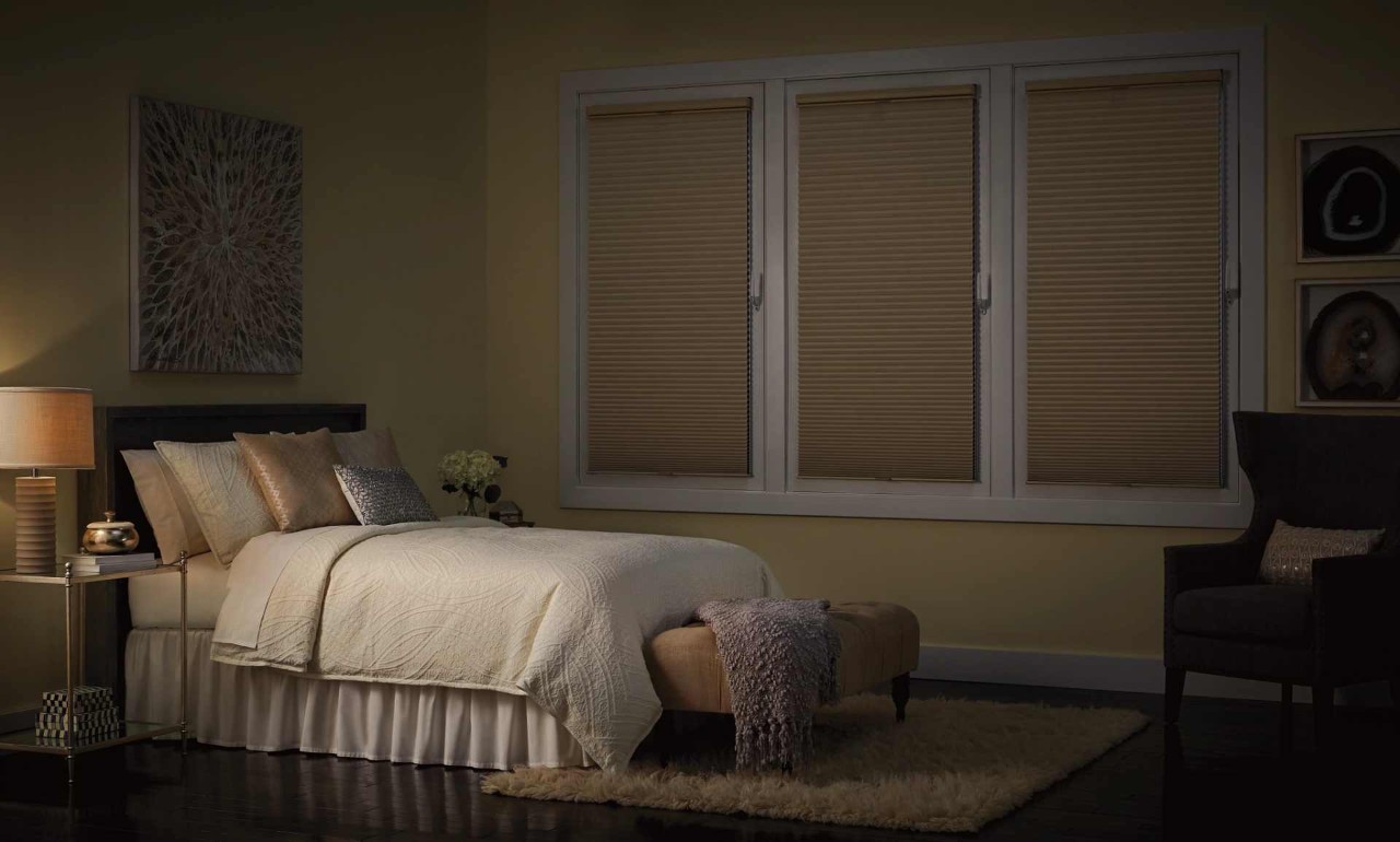 Duette Honeycomb shades in a dark bedroom near Newport News, Virginia (VA)